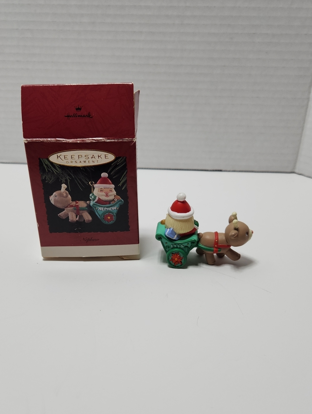 Hallmark 1994 Keepsake -- Nephew Santa in Cart
